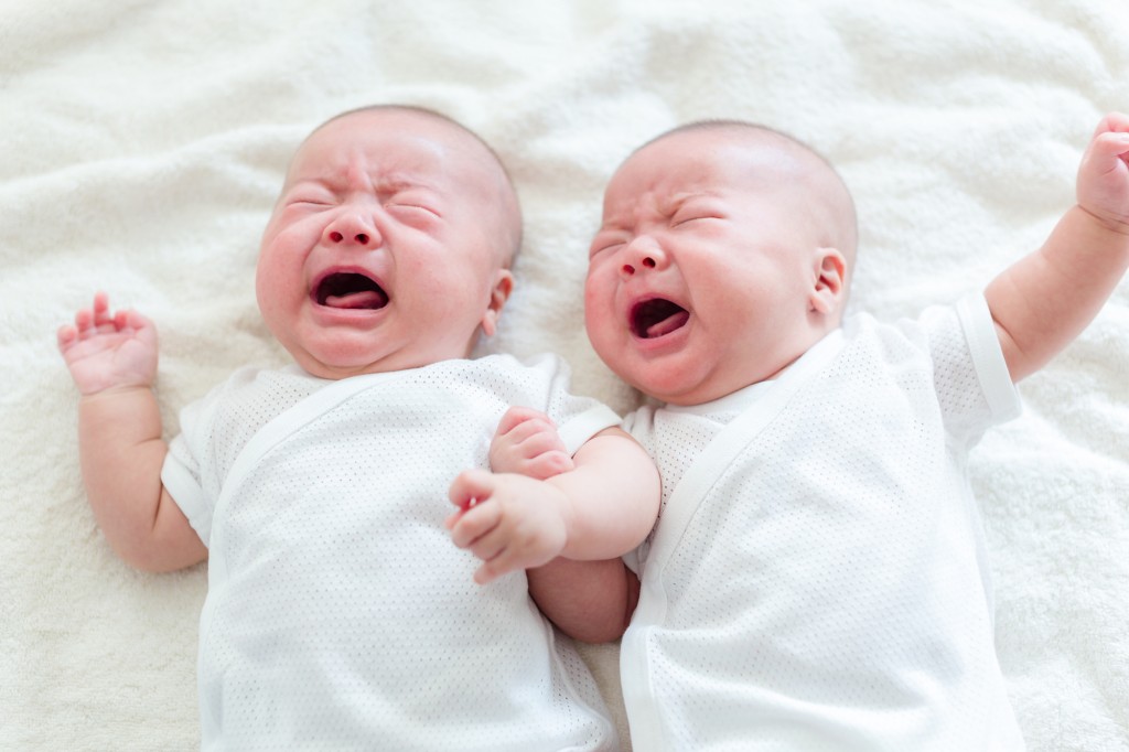 Twins brother baby crying