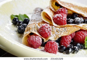 stock-photo-delicious-tasty-homemade-crepes-with-raspberries-231401329